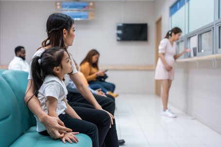 mother and daughter in hospital waiting room